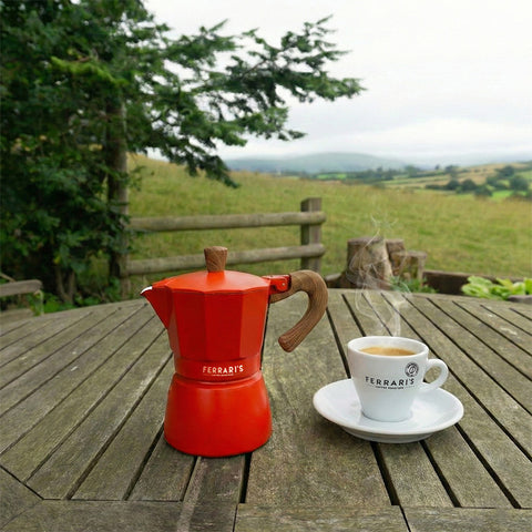 Red aluminium Ferrari's Coffee 3-cup moka pot with wooden-effect handleand